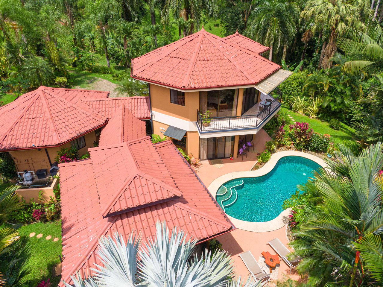 Stunning Tropical Home in Gated community with Hundreds of fruit trees  
