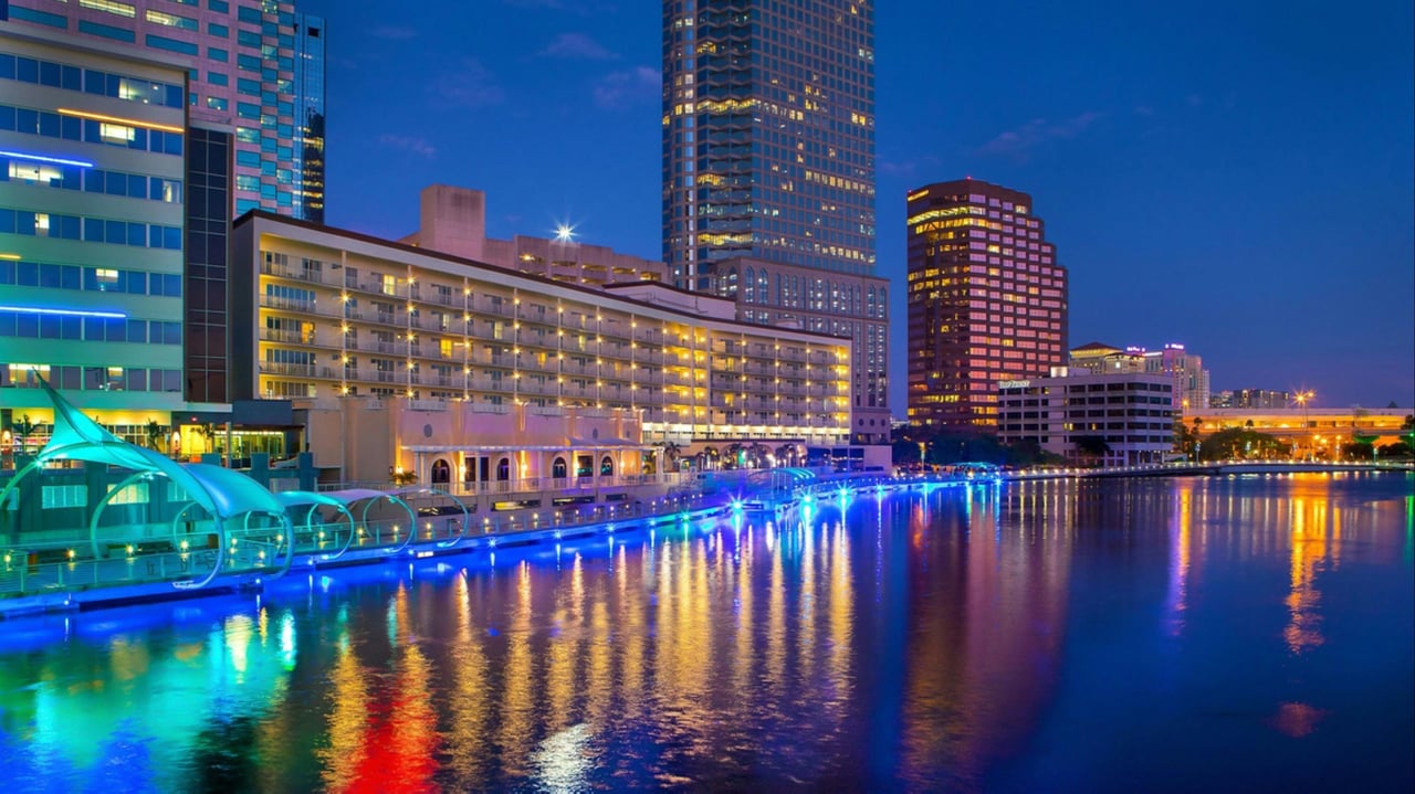 Historic Ybor City in Tampa at night with illuminated restaurants and nightlife along Seventh Avenue.