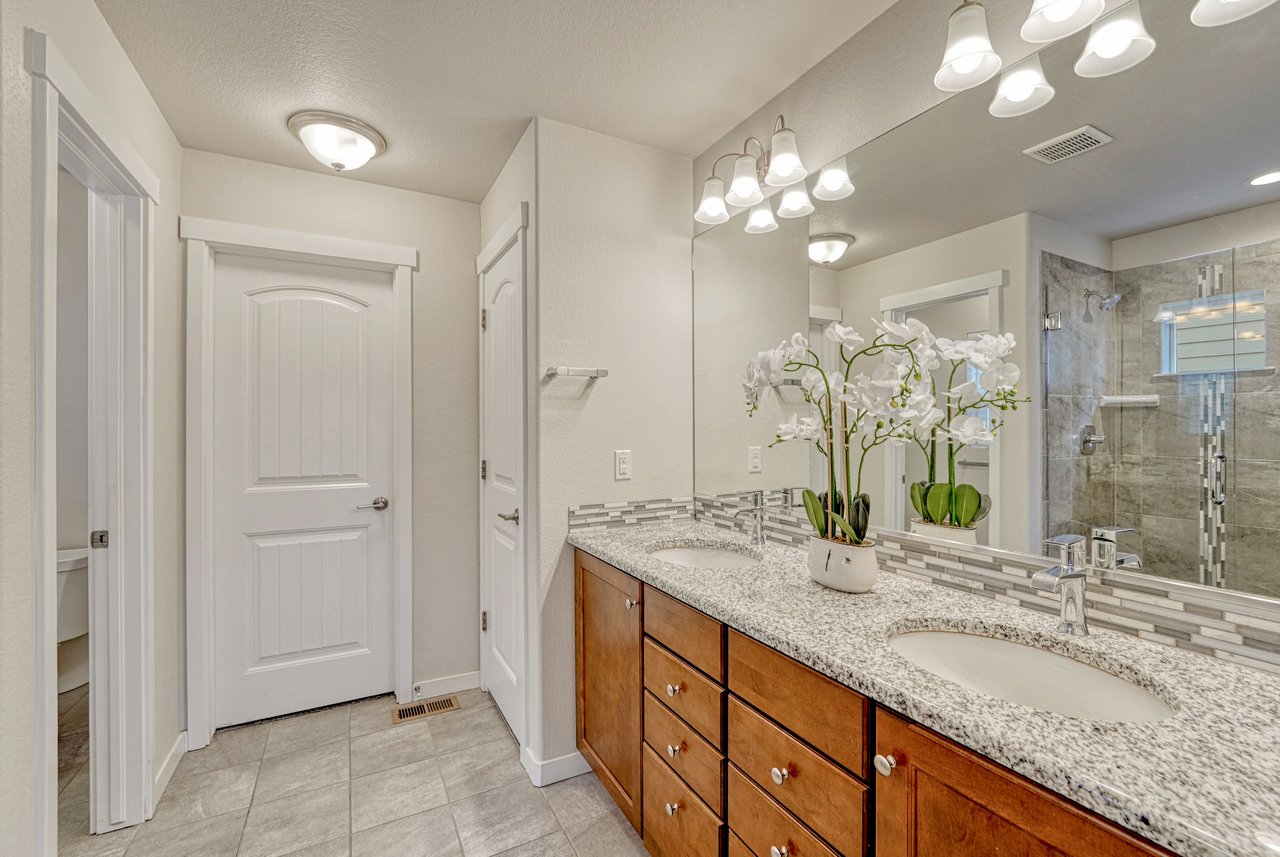 Primary bathroom with double-sink vanity