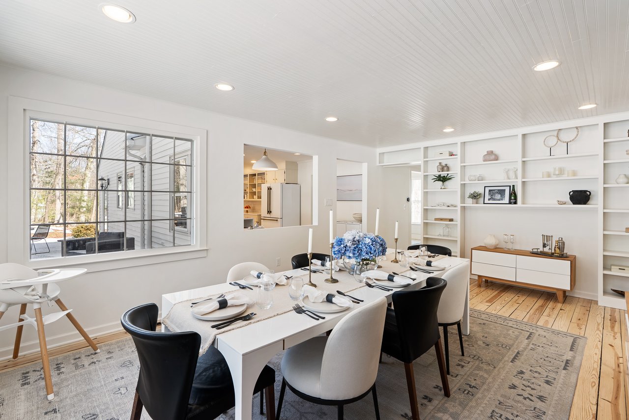 Staged luxury dining room prepared for buyers in a Hartford County Connecticut home listing