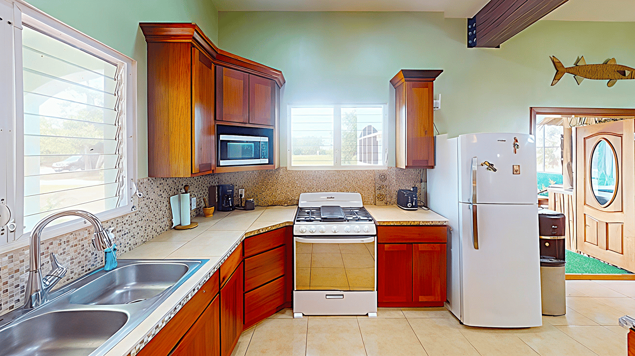 Waterview Villa steps away from 9 hole golf course and the Caribbean Sea