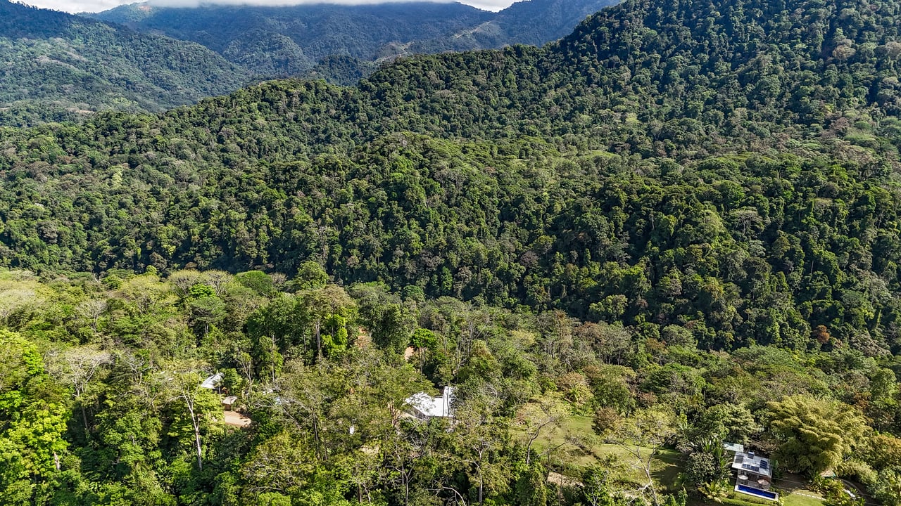 Jungle, Mountain & Valley View Lot with Two Large Plantels, Bordering a Crystal Mountain River with Swimholes & a Waterfall