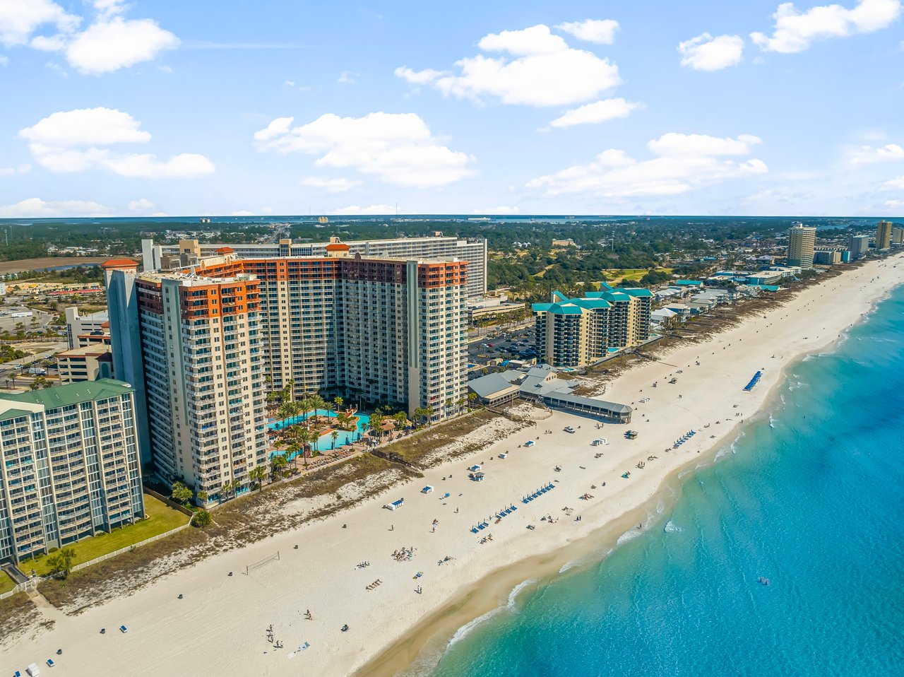 Aerial view of beachfront condo towers along the Gulf in Panama City Beach