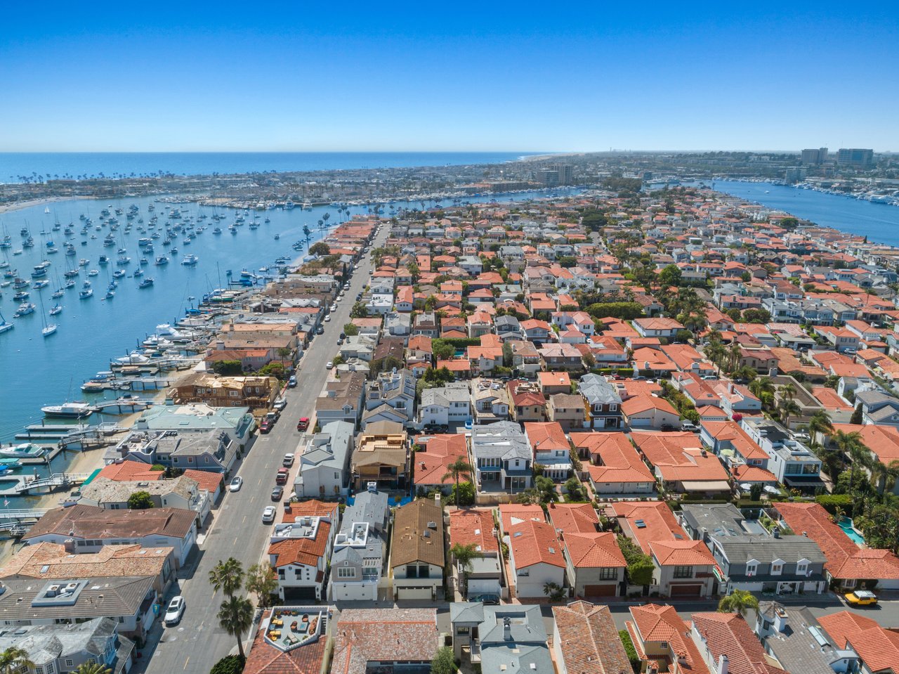 A waterfront view of luxury homes on Lido Island in Newport Beach during winter