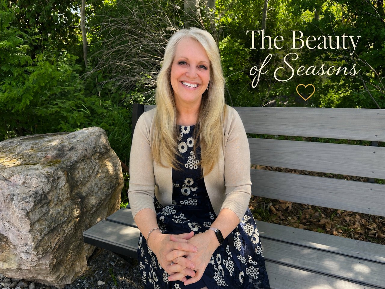 Sharla Ellis sitting outdoors surrounded by greenery reflecting on home, family, gratitude, and the beauty of life’s seasons.