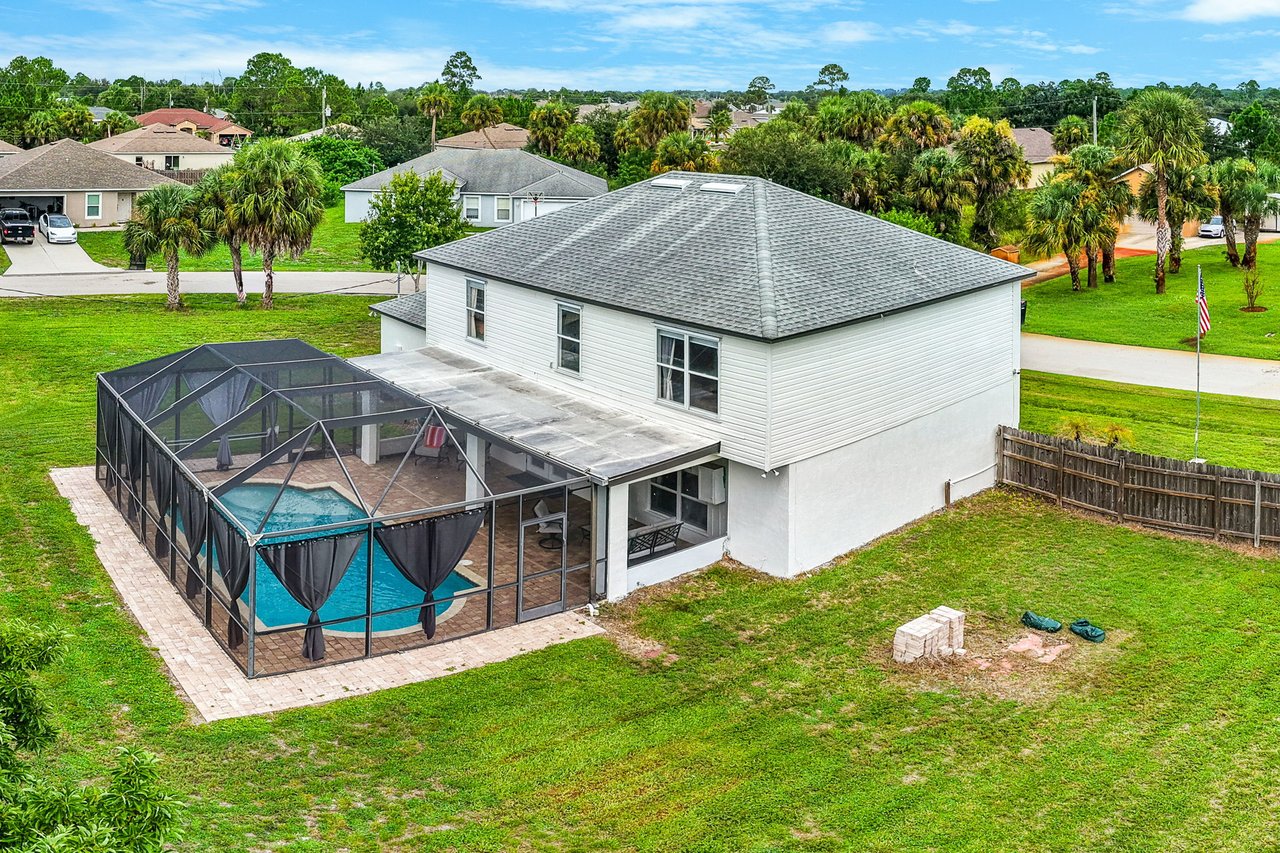 Two-story pool home for sale in Palm Bay, FL