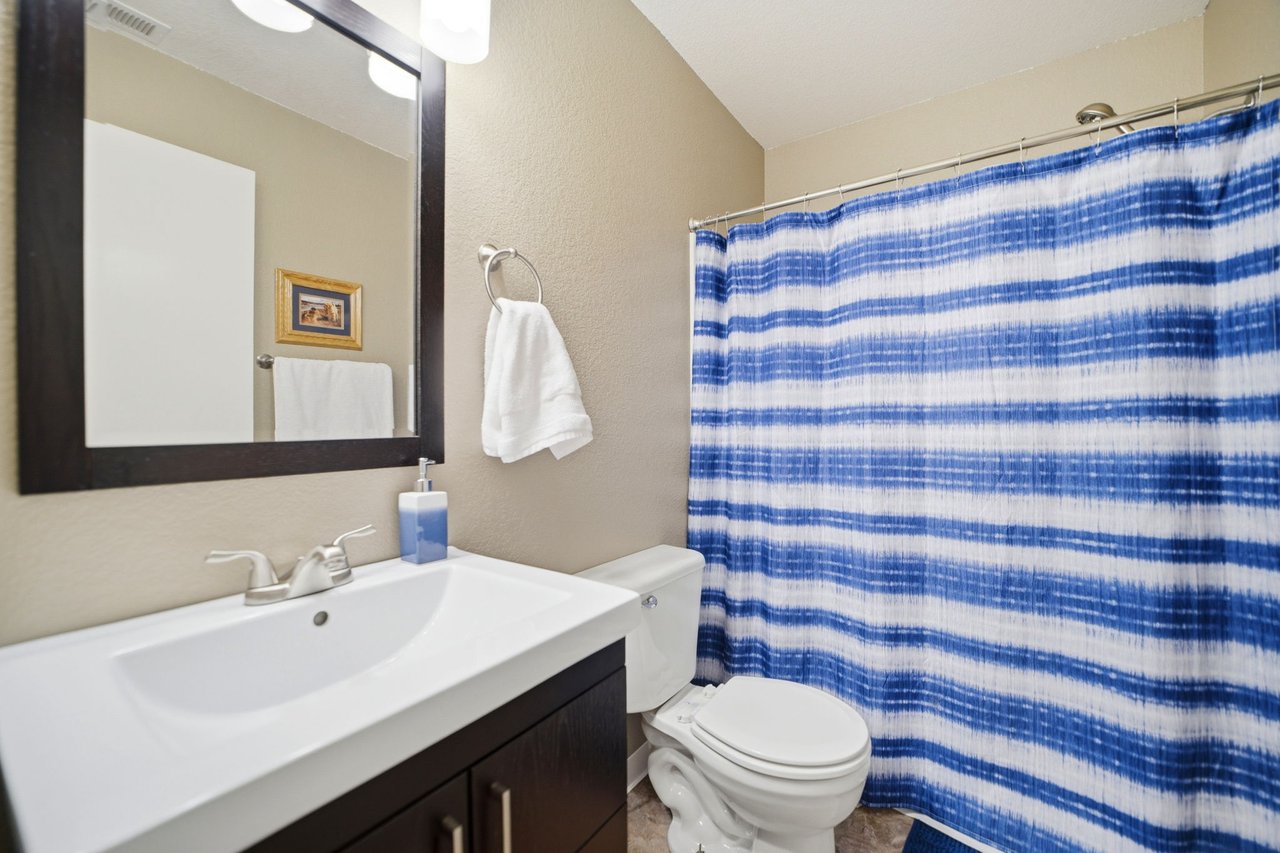 Second hall bathroom between bedrooms / office.