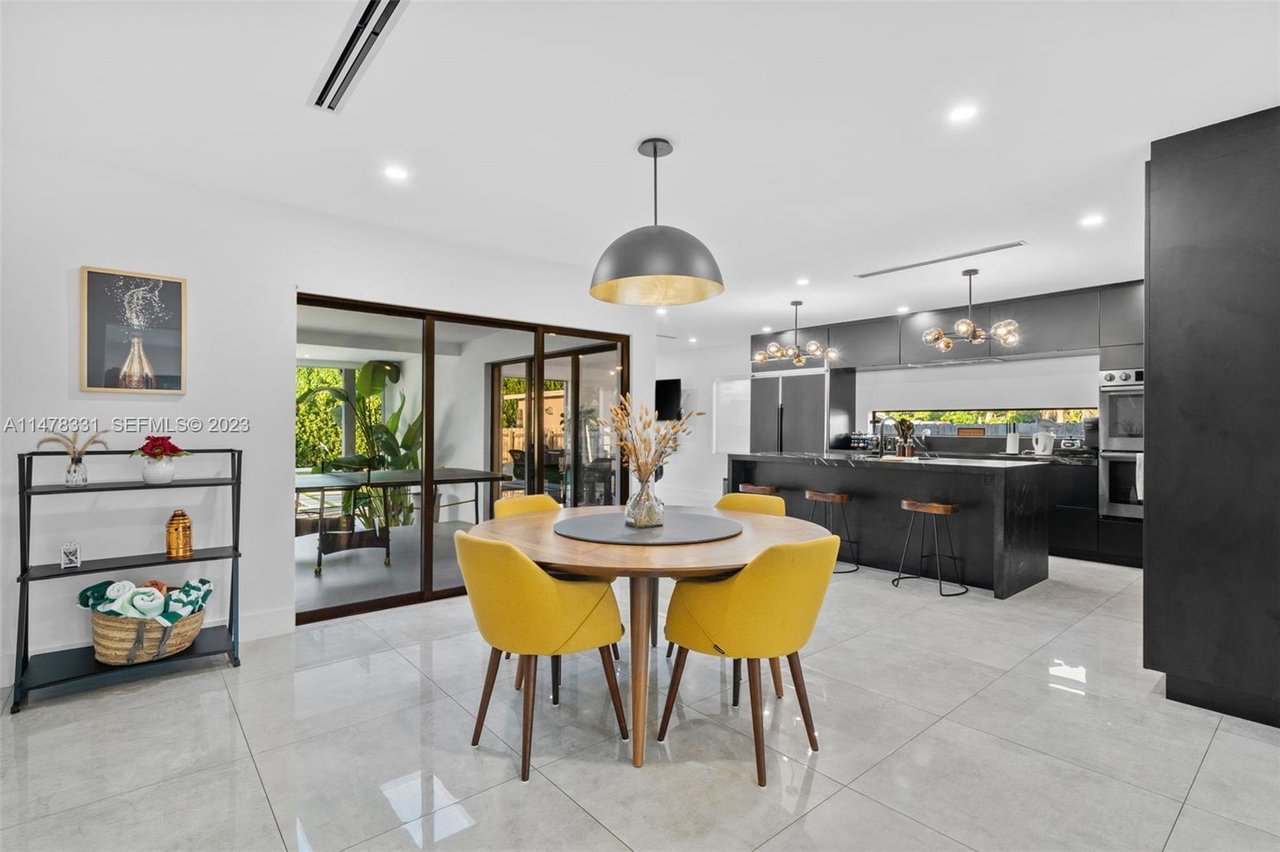 miami-pool-home-sold-dining