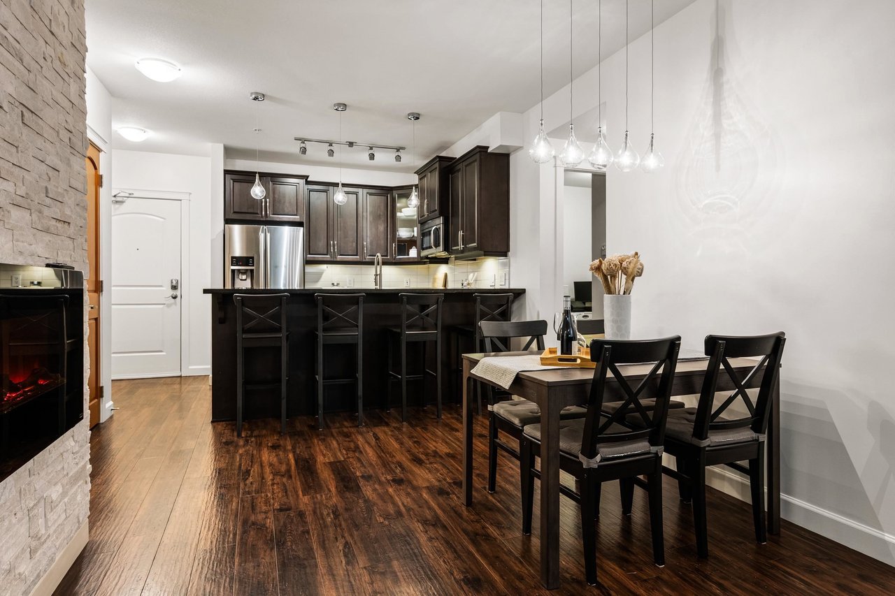 154-8328 207a St
