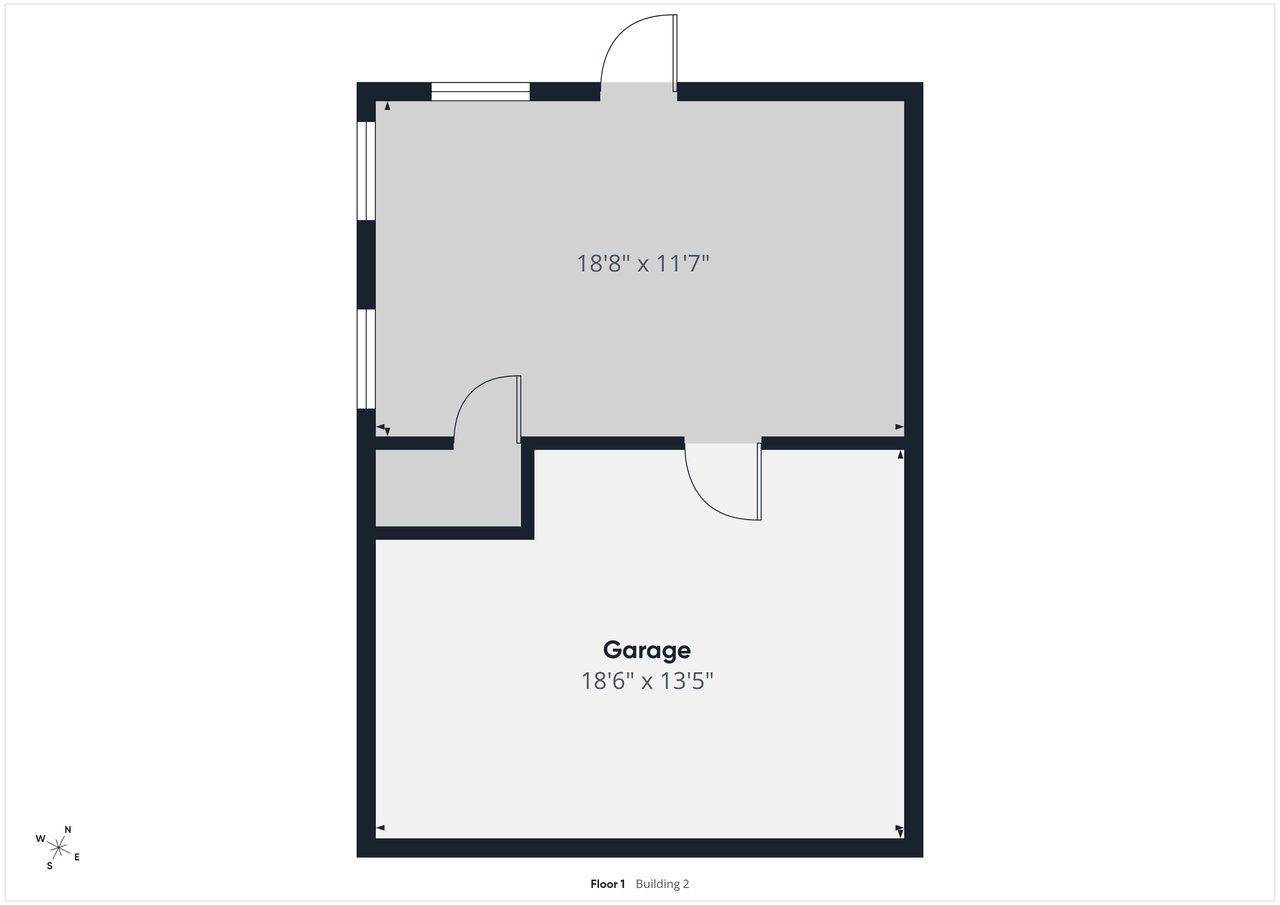 First-floor plan with an attached garage and room dimensions.