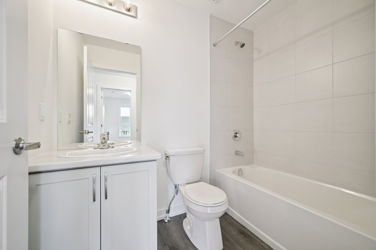 Brand-new, never-lived-in stacked townhome