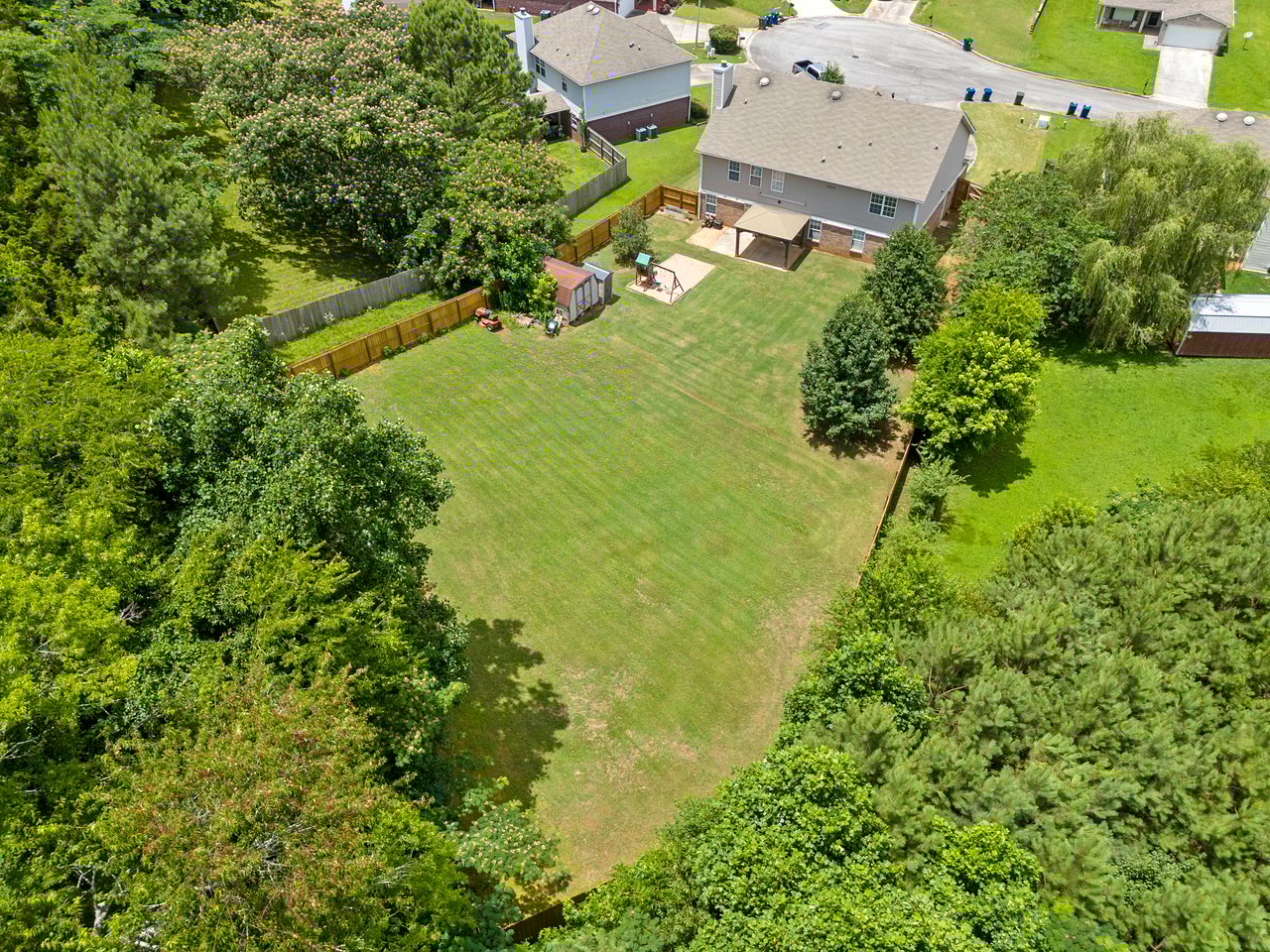 LOTS of Space both Inside and Outside!! Large Fenced in Backyard!