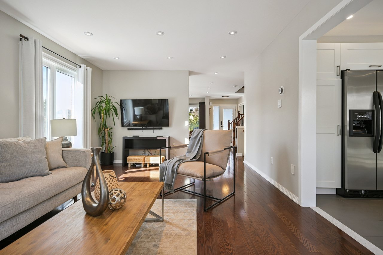 Sun-Filled Sophistication on a Rare Pie-Shaped Lot in West Oak Trails