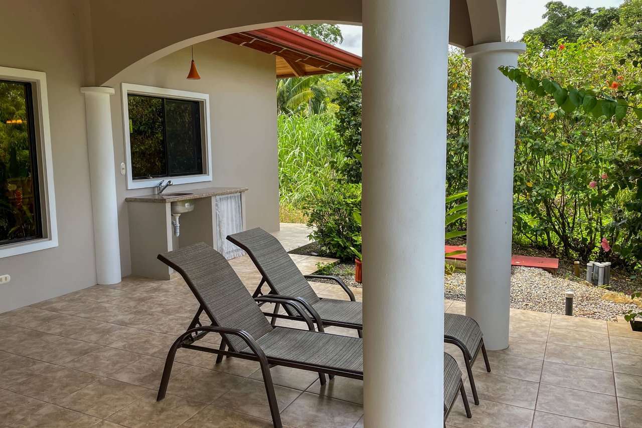 Turnkey Spacious Home with Open Layout, Pool & Small Ocean View in Ojochal Gated Community