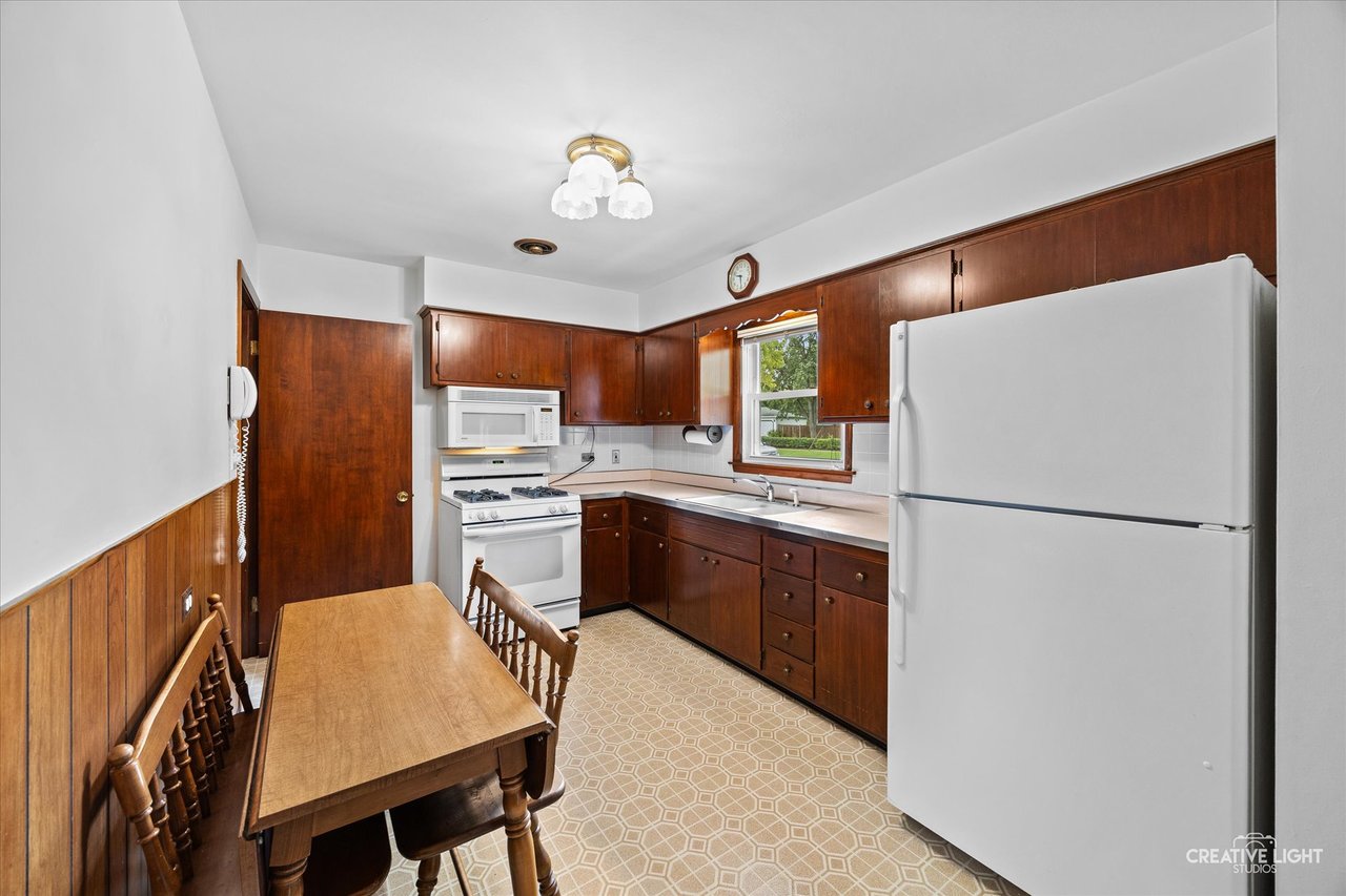 Eat-in kitchen with pantry closet at  Crestwood Drive, Roselle, IL