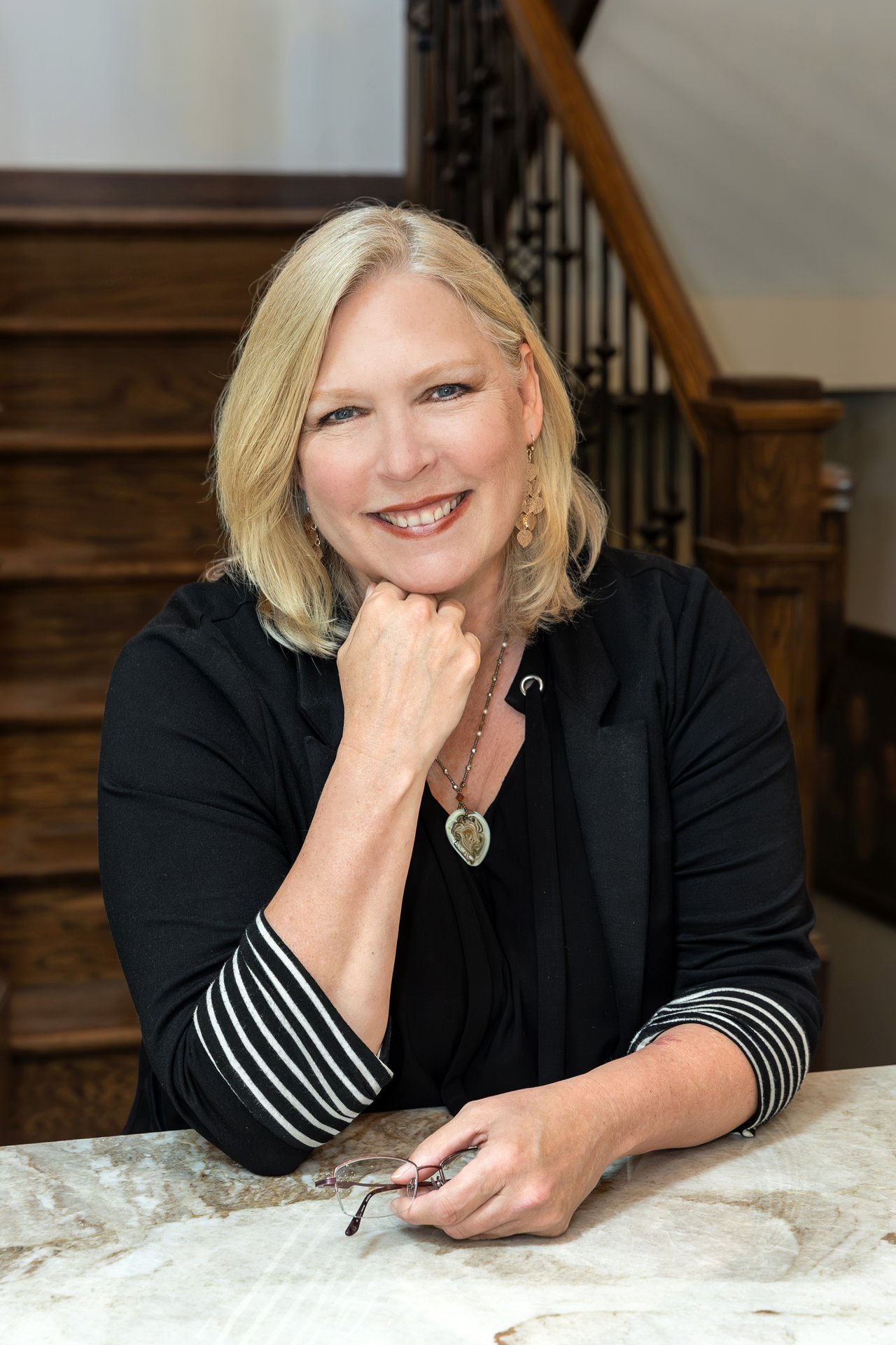 Shanon Tully real estate broker and lead agent for The Tully Team at Platinum Partners Realtors in Downers Grove Illinois