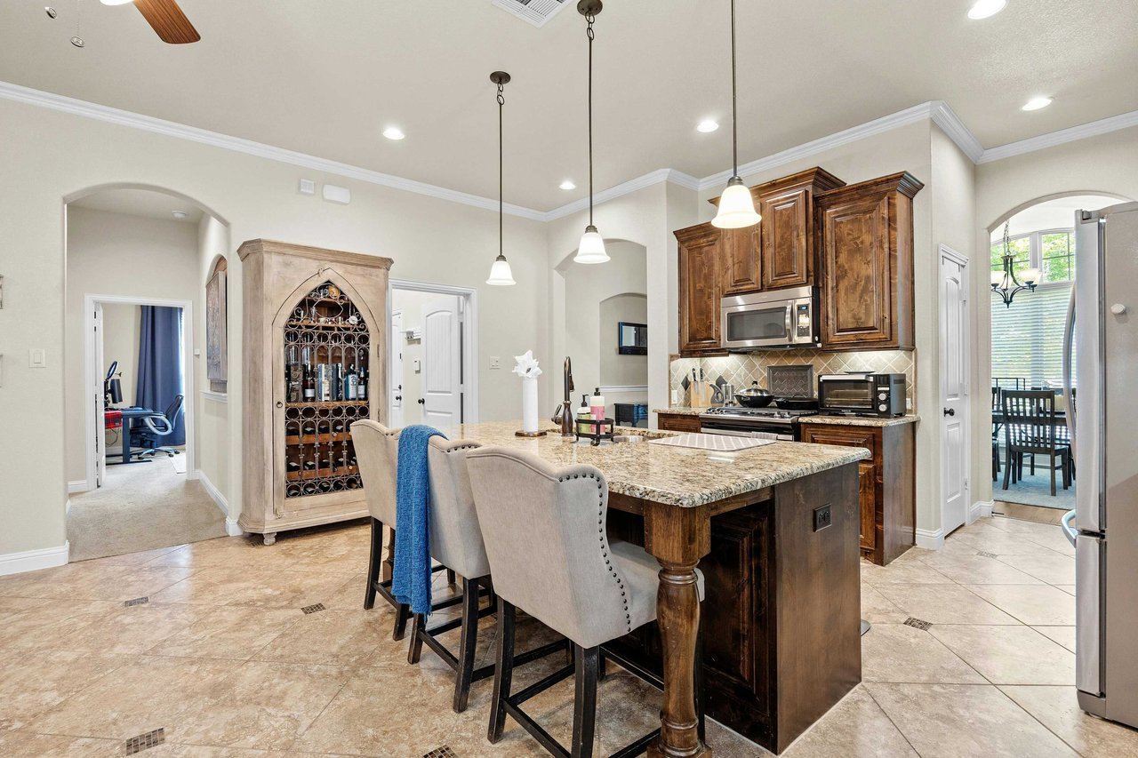 Beautifully Appointed Single-Story in Oak Creek: Modern Floors and Screened-In Patio Overlooking Green Space w/ NO Backyard Neighbor!