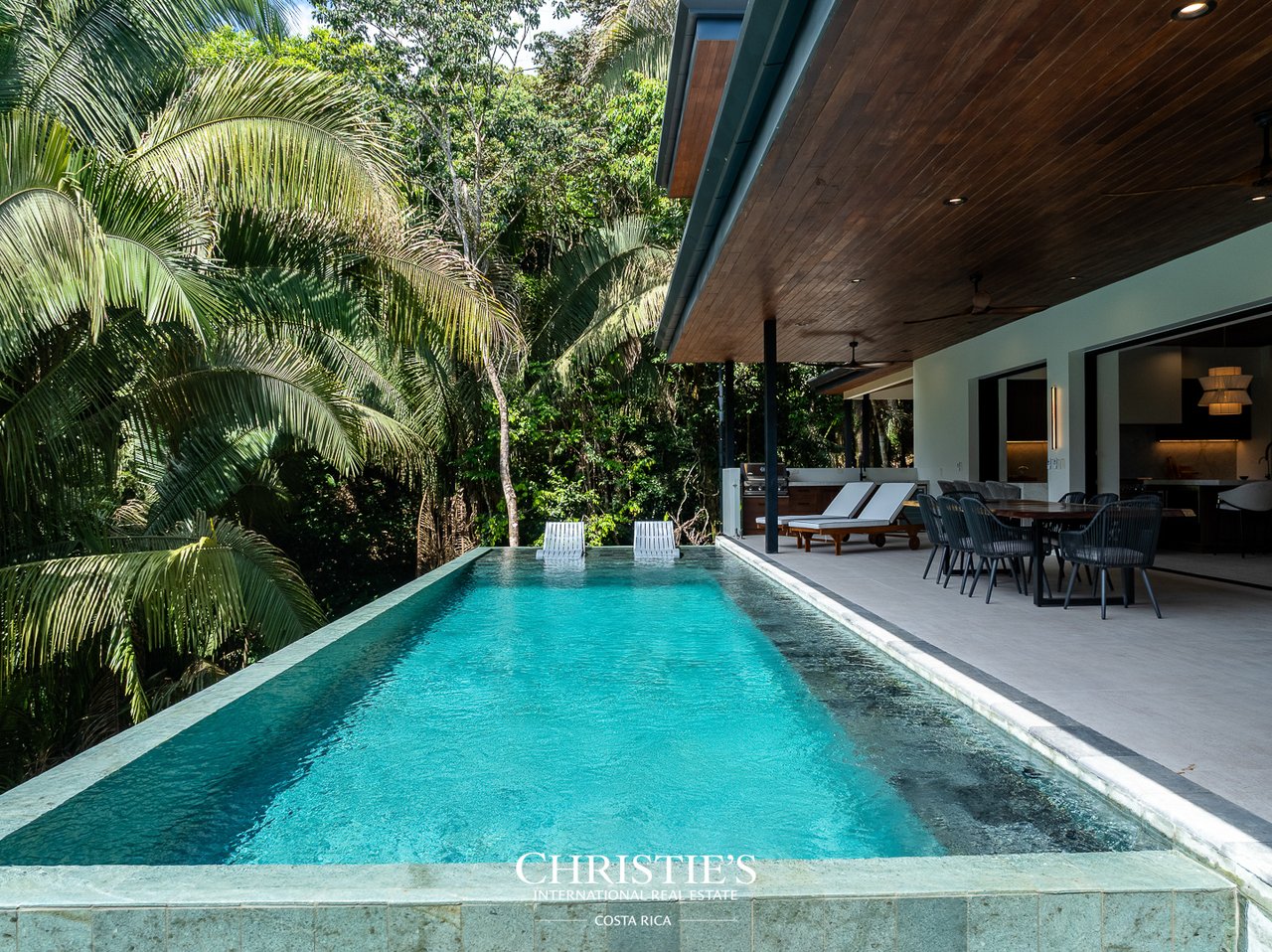 Modern Tropical Ocean & Mountain View Home
