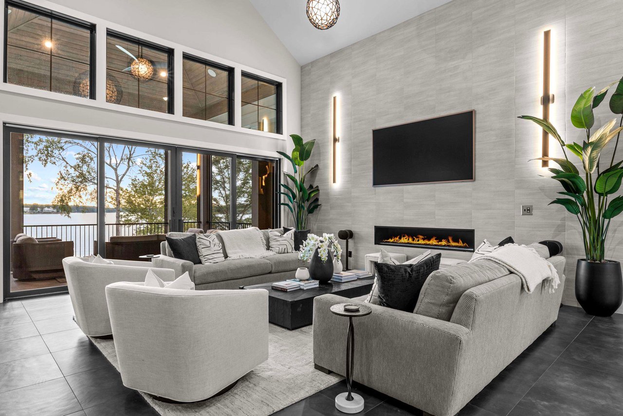 Modern Lakefront Masterpiece with 24ft Ceilings & the Best Sunset Views