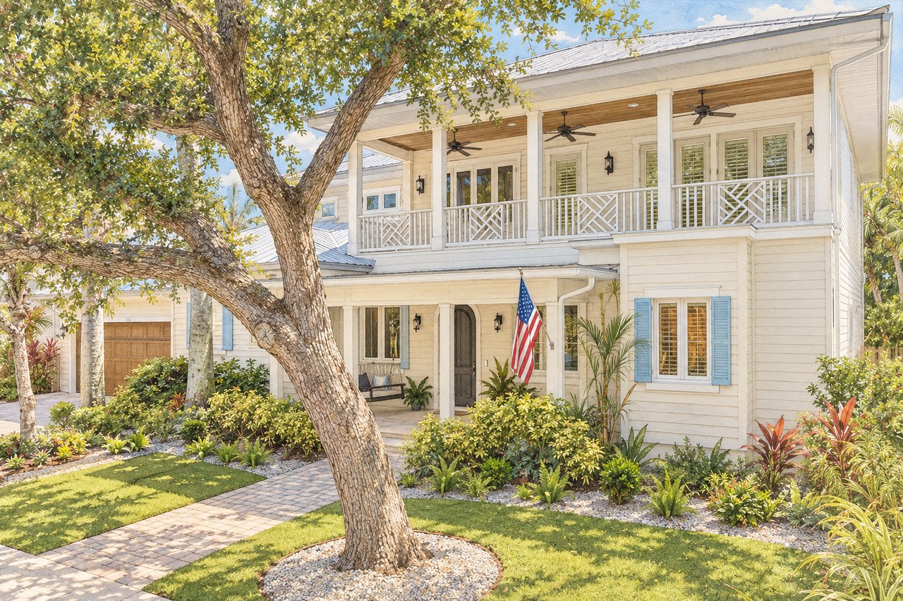 Two-story white coastal-style home with a covered balcony, front porch, and landscaped garden.