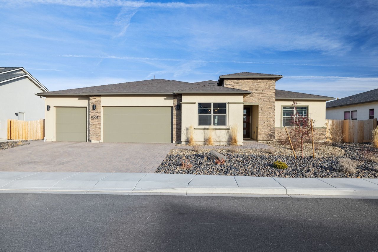 Front exterior of 11658 Sugarloaf Peak Drive, a newer Ryder home in Harris Ranch in Spanish Springs, Nevada