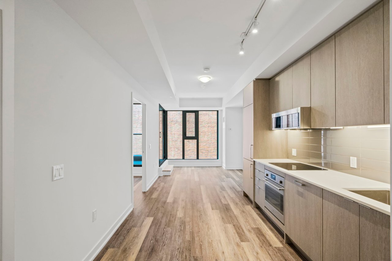 SOLD: Luxe Living in Brand New Boutique Building 