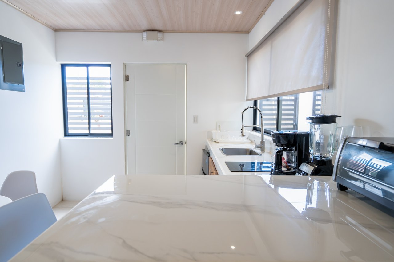 A House With An Upper Live-In Suite & Two Fully Serviced Downstairs Rental Apartments Less Than 1 km From The Entrance to Marino Ballena National Park