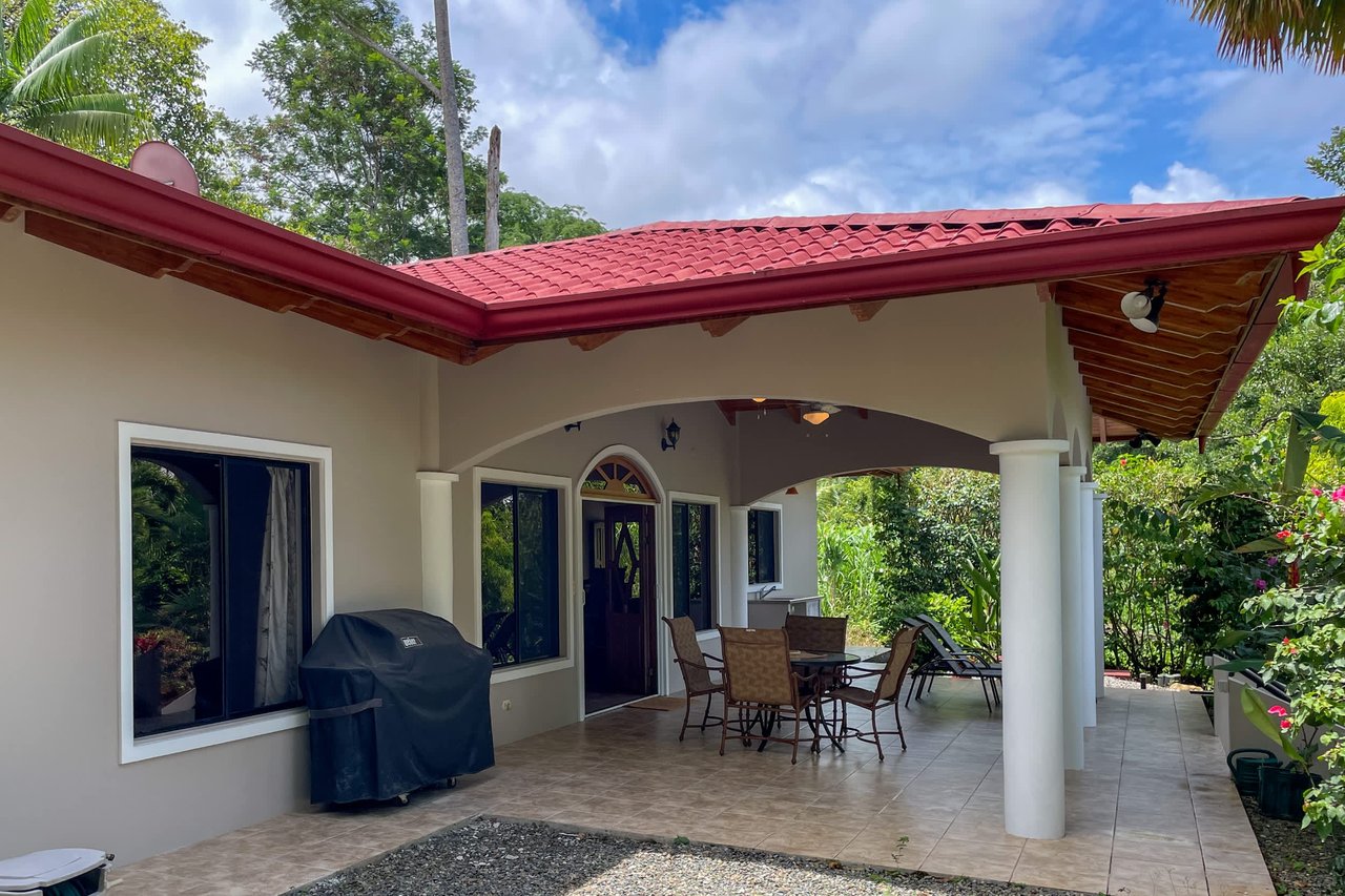 Turnkey Spacious Home with Open Layout, Pool & Small Ocean View in Ojochal Gated Community