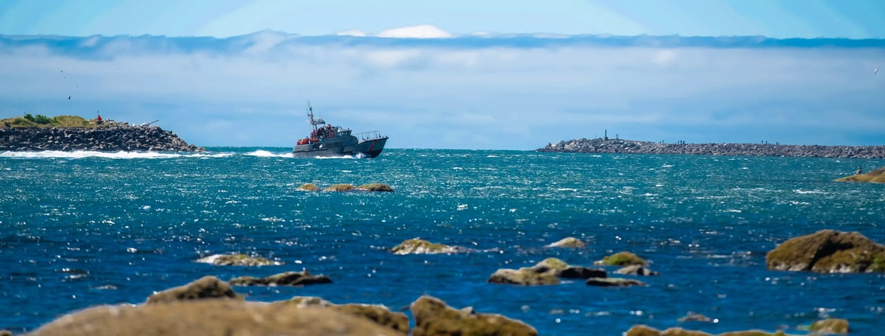 Barview Oregon on a sunny day with the coast guard underway