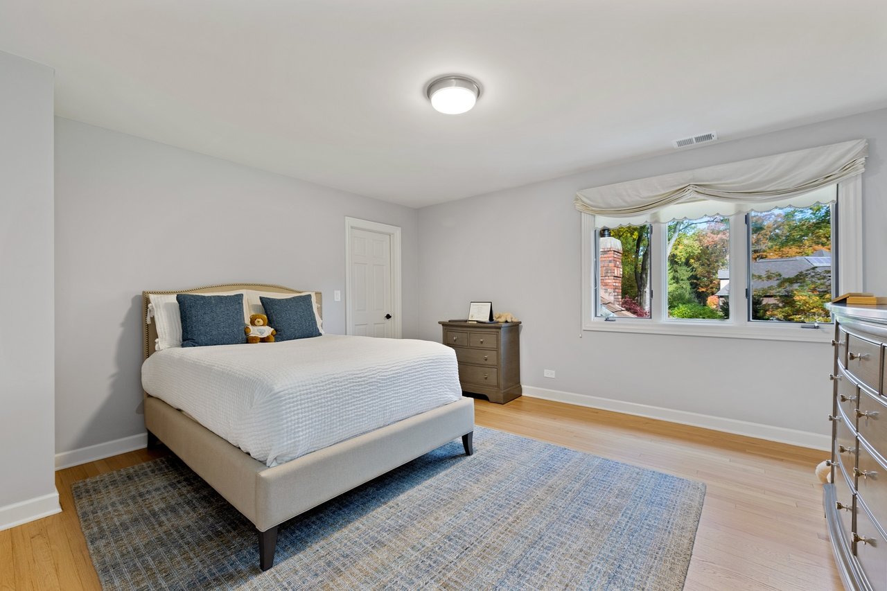 Beautifully Appointed Home in a Gated Community on Over an Acre of Professionally Landscaped Grounds with Pond Views