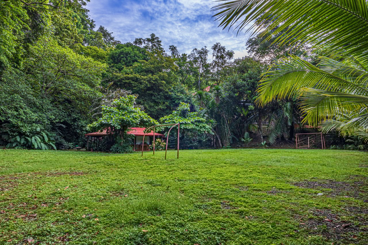 10-Acre Uvita Commercial Property with Existing Hotel & Highway Frontage – Development Potential Near the Beach