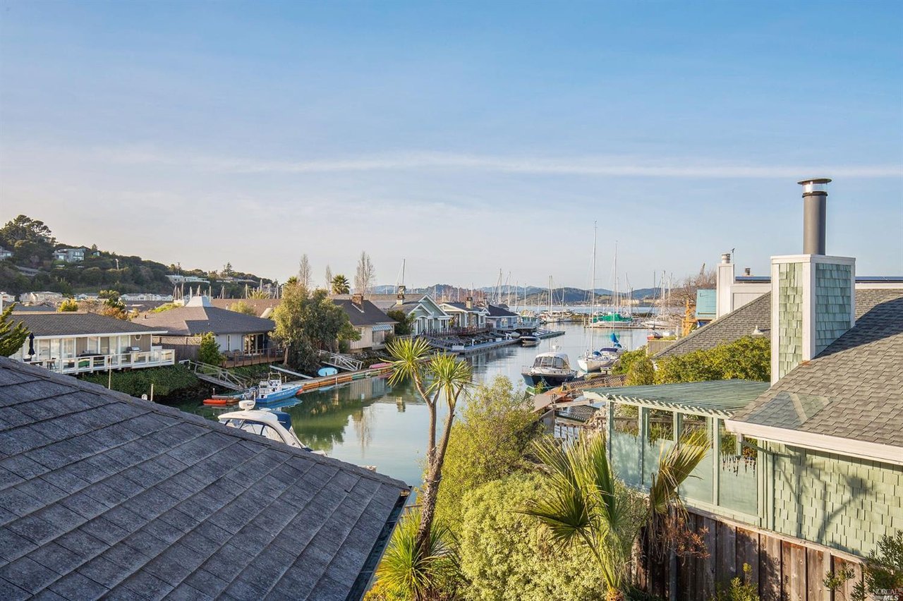 Dramatic Waterfront Home with Private Boat Slip- Represented Buyer