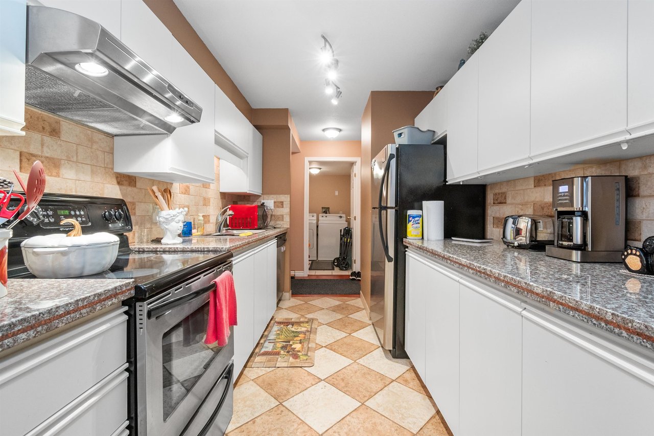 203-7694 Evans Rd