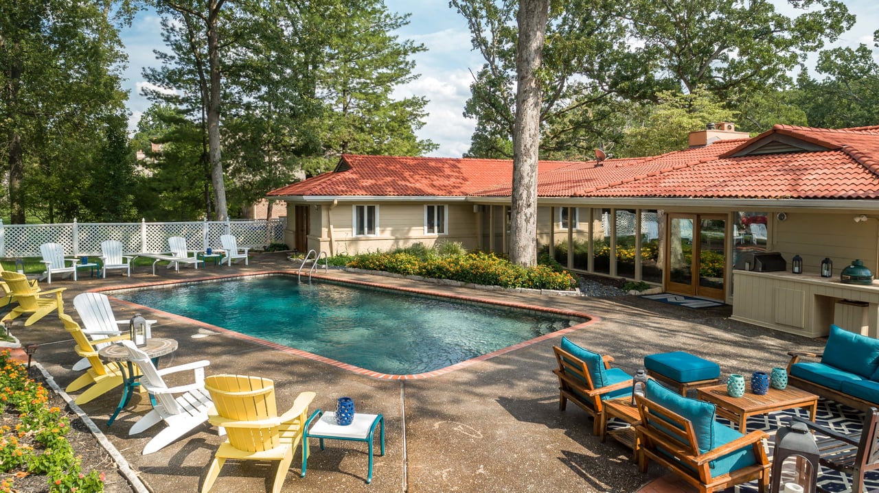 A Special Retreat on a Prized One Acre Lot With Pool and Tennis Court