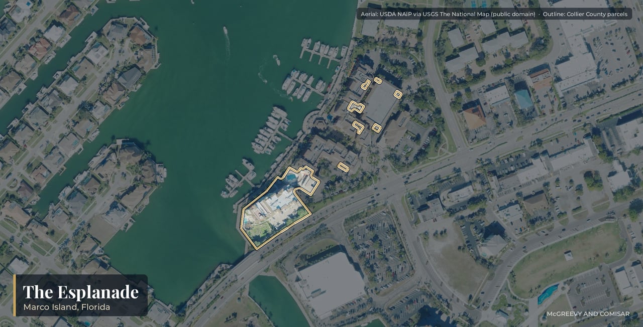 Aerial view of The Esplanade on Marco Island, Florida, the condominium residences and shops at 720 to 760 North Collier Boulevard on Smokehouse Bay