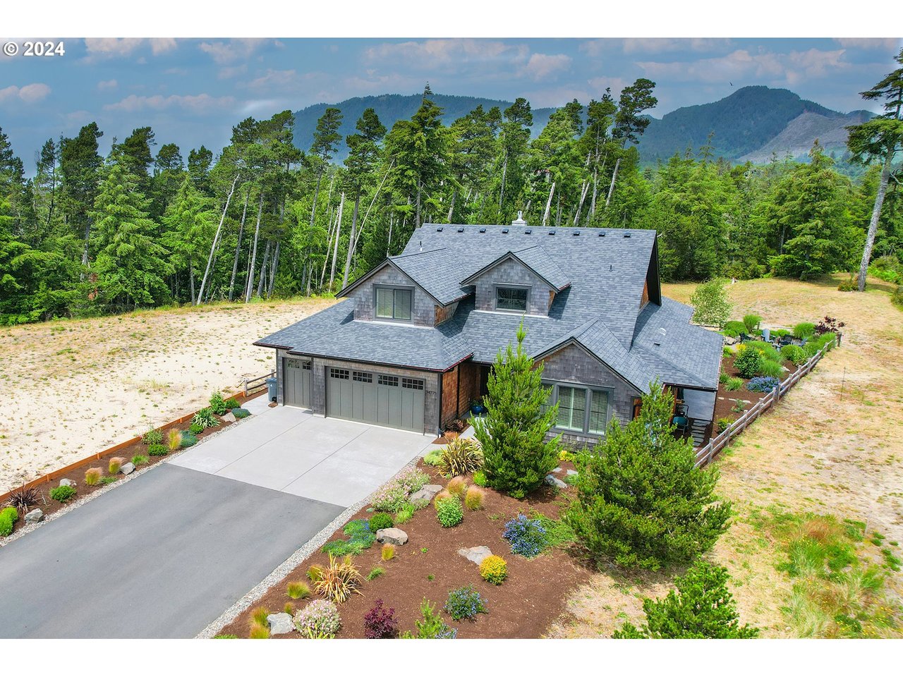 Sold custom coastal home at 34775 Lodgepole Dr in Manzanita Oregon with ocean and mountain views