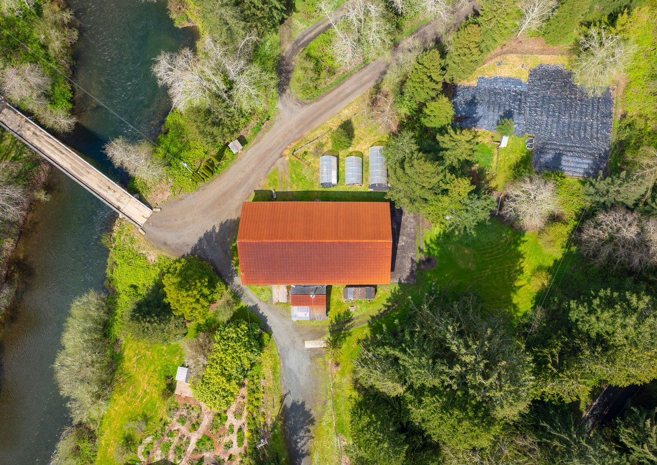 aerial view of a rural farm on the nehalem river barn and gardens