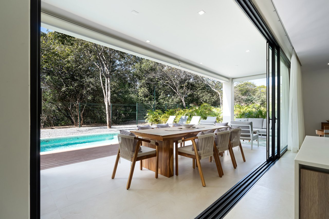 Villa Tropical Dawn | 4-Bedroom Modern Oasis in Bosques de Pinilla with Forest Views & Resort-Style Amenities