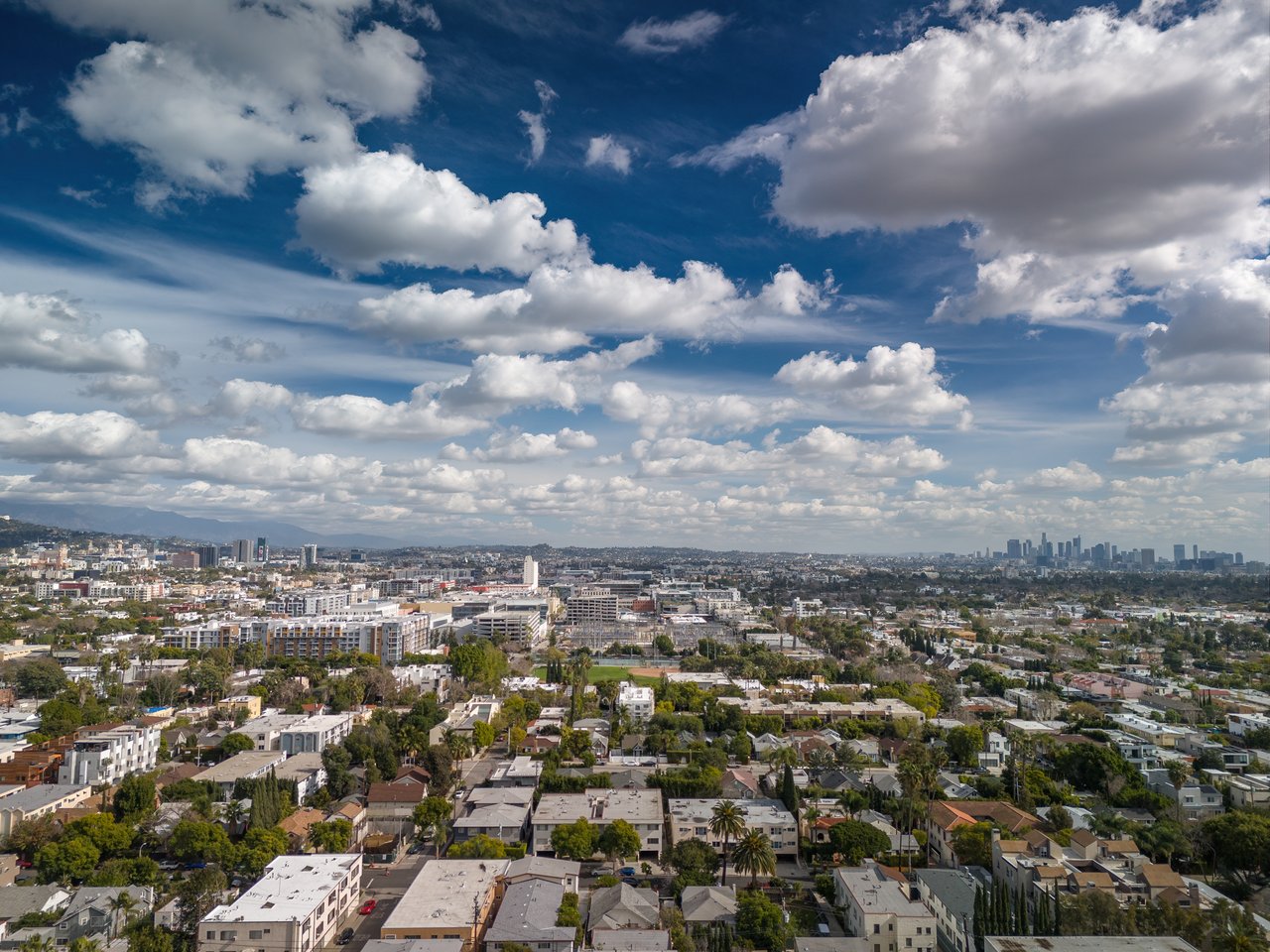 Aerial view over Sawtelle’s residential streets, with downtown Los Angeles visible in the distance.