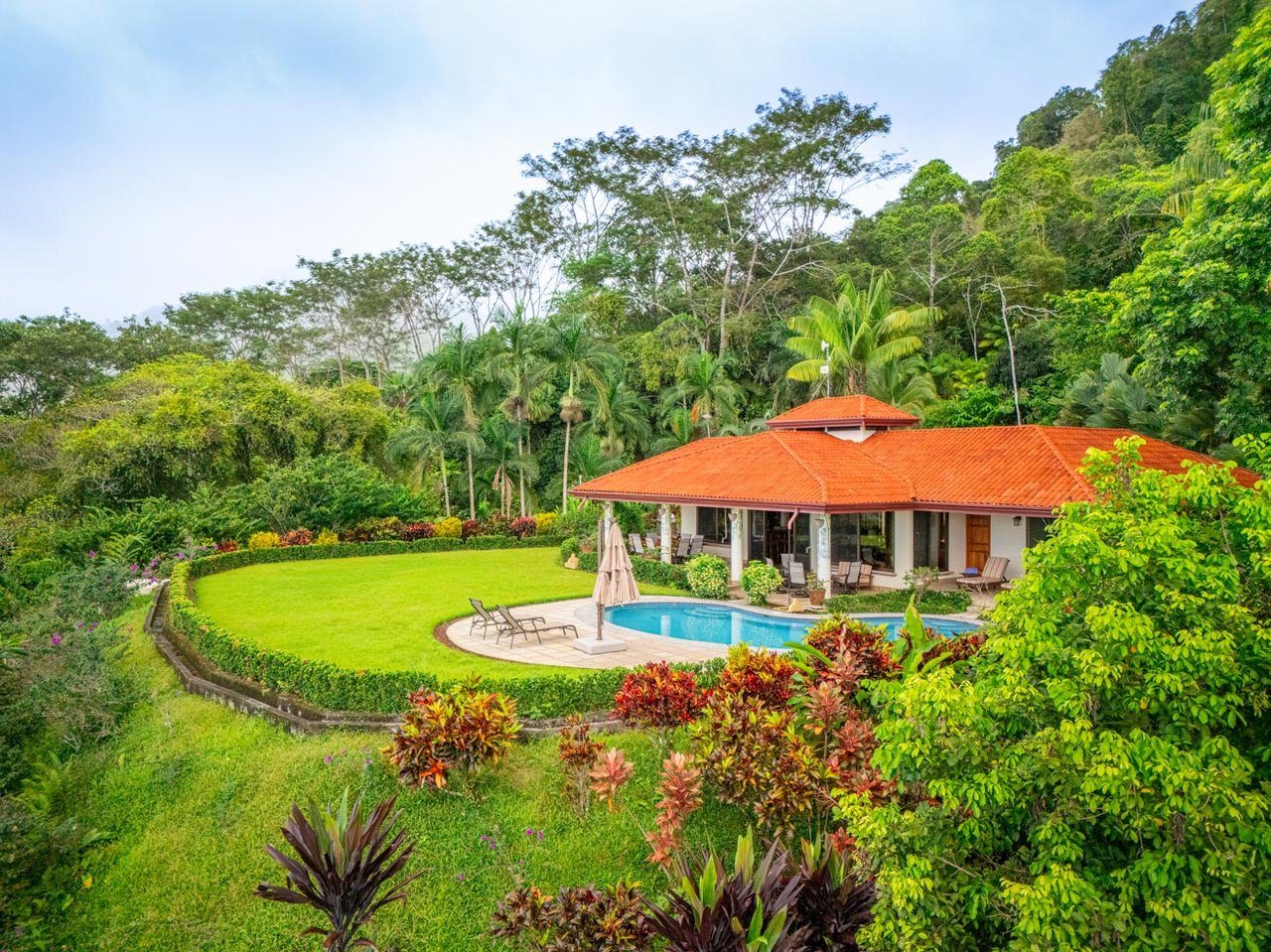 Ocean, jungle & mountain views on a meticulously landscaped 3-home family compound