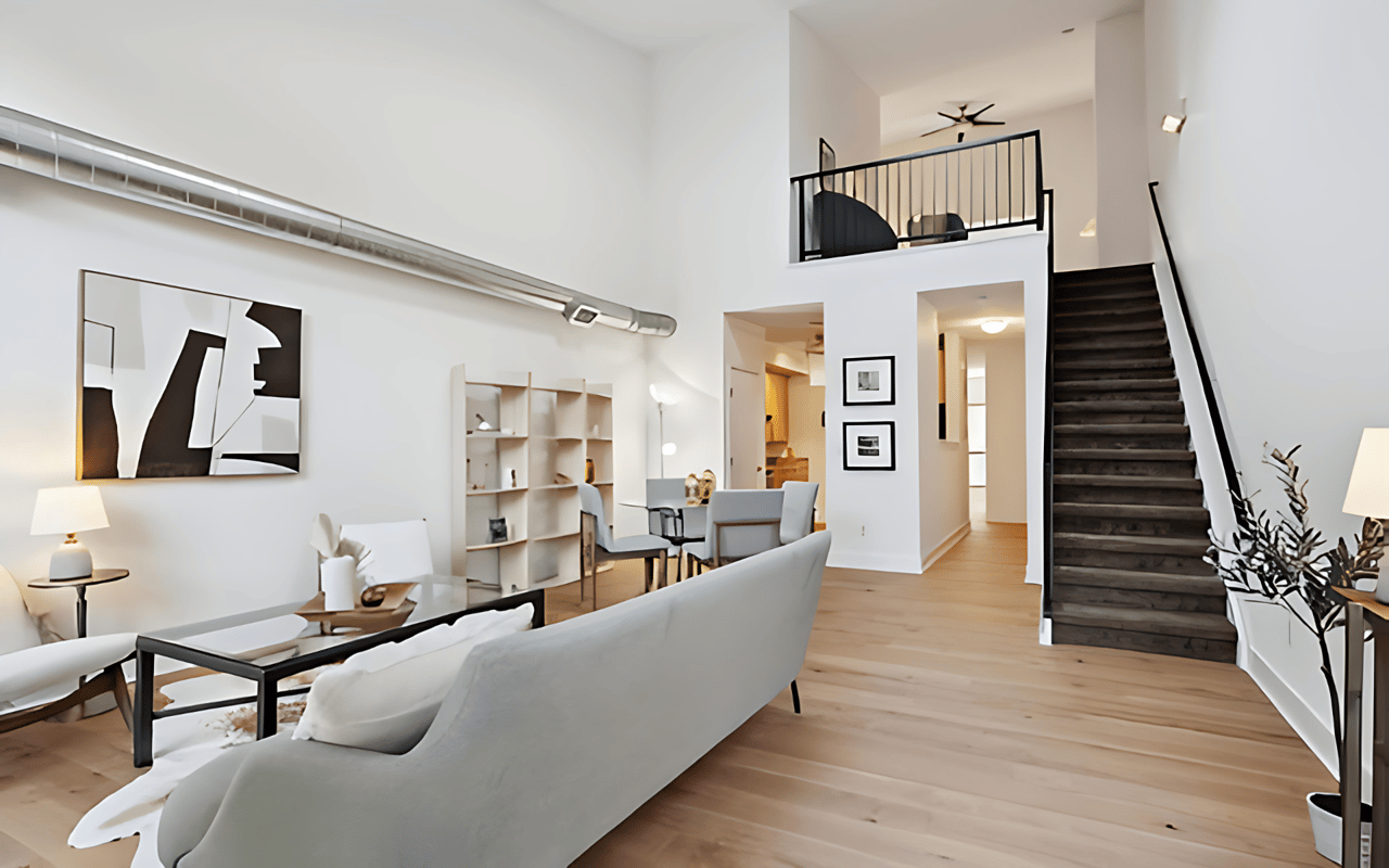Just Listed: Soaring Vaulted Ceilings, 10’ Windows, and a Sleek Industrial Vibe Make a Striking First Impression in This Two-bedroom, Two-bathroom Fire Clay Loft!