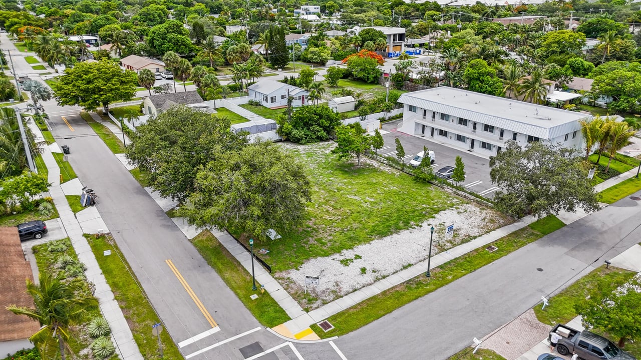 Angled aerial photo of 248 SE 1st Ave, Delray Beach, showing lot size, surrounding streets, and nearby residential buildings.