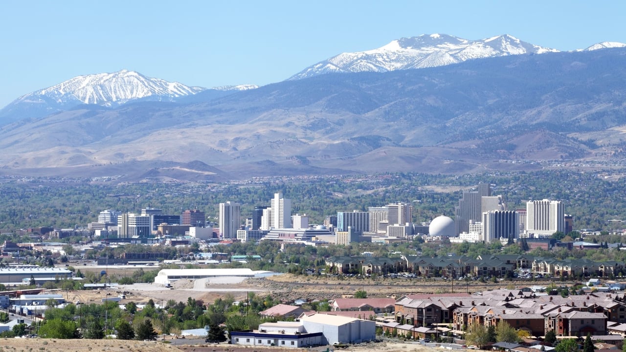 Aerial view of South Reno Nevada neighborhoods with Sierra Nevada mountains in the background