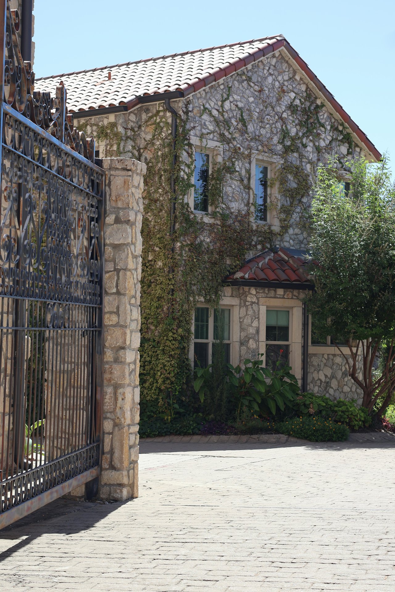 A perfectly prepared and staged luxury home exterior in West Austin illustrating strategic market positioning.