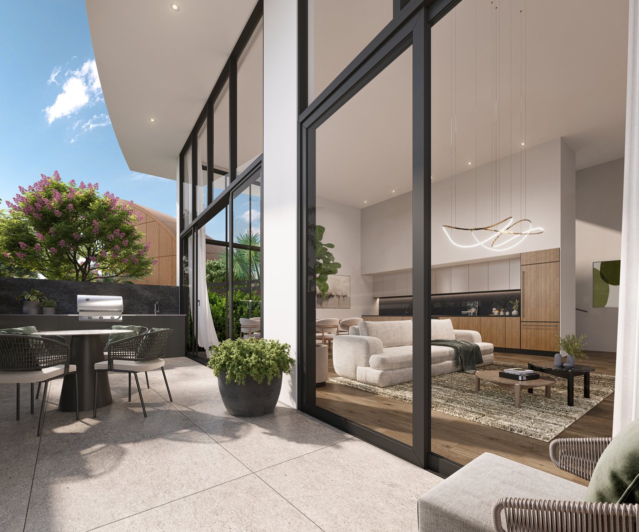 Modern residence with a glass-walled living room opening onto a covered patio with outdoor dining and a grill.