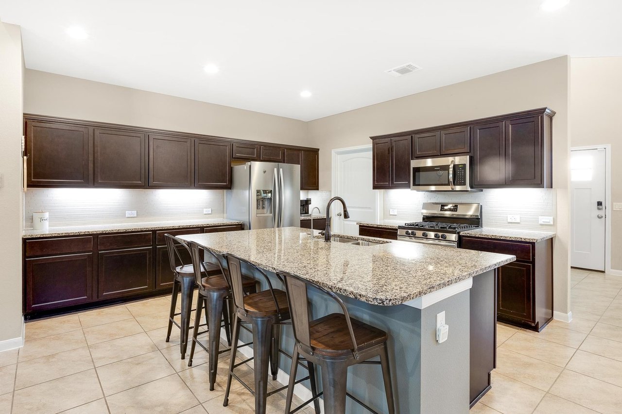Exceptionally rare and meticulously cared-for home, nestled against the breathtaking backdrop of McKinney Falls State Park!