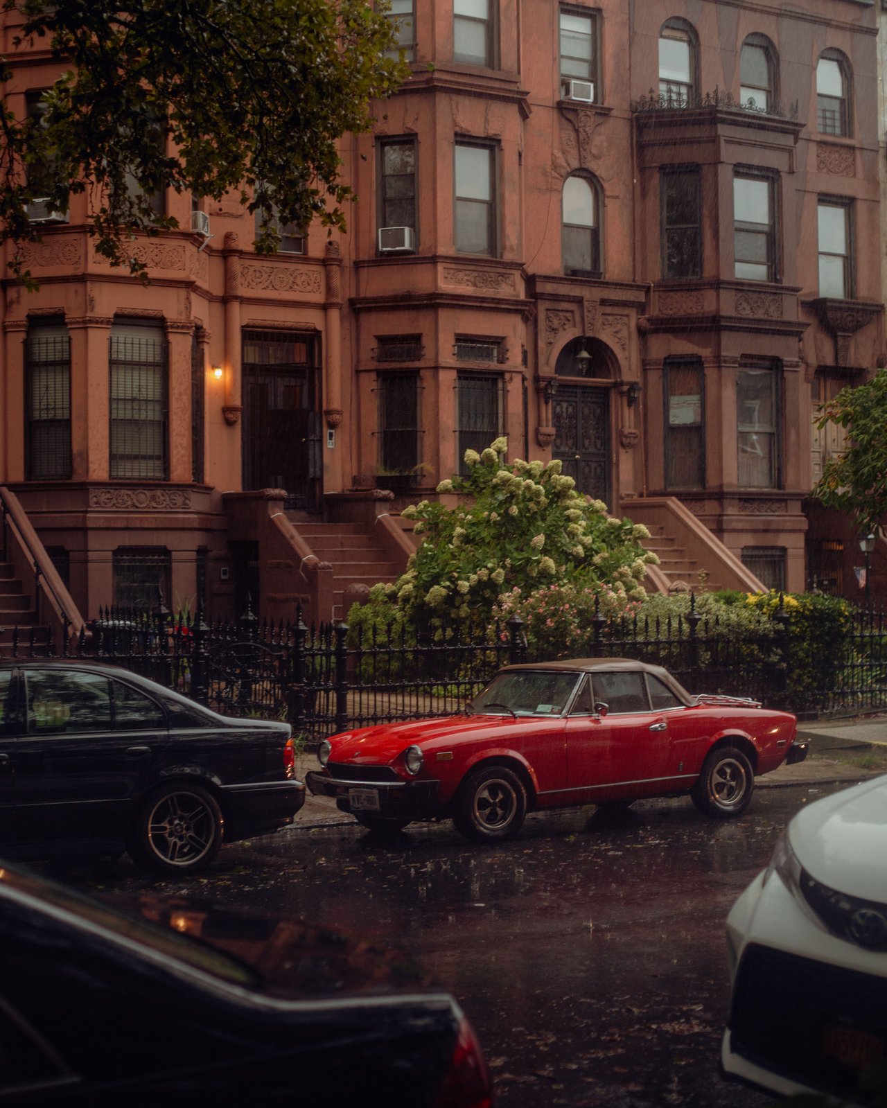 Historic brownstones, townhouses, tree-lined streets, and boutique condominiums along President Street in Carroll Gardens, Brooklyn.