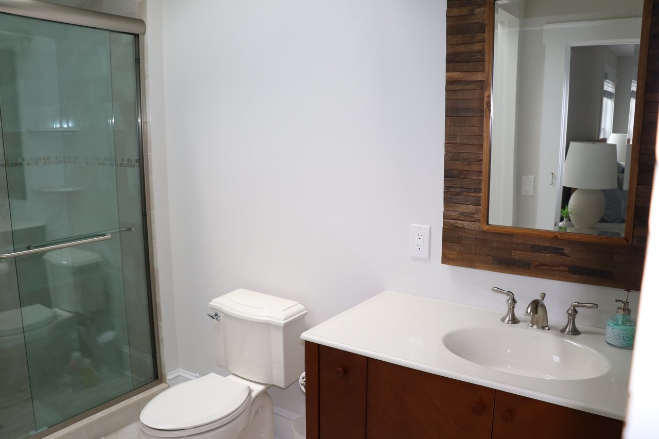 A Classic Bay Header with a Pool House