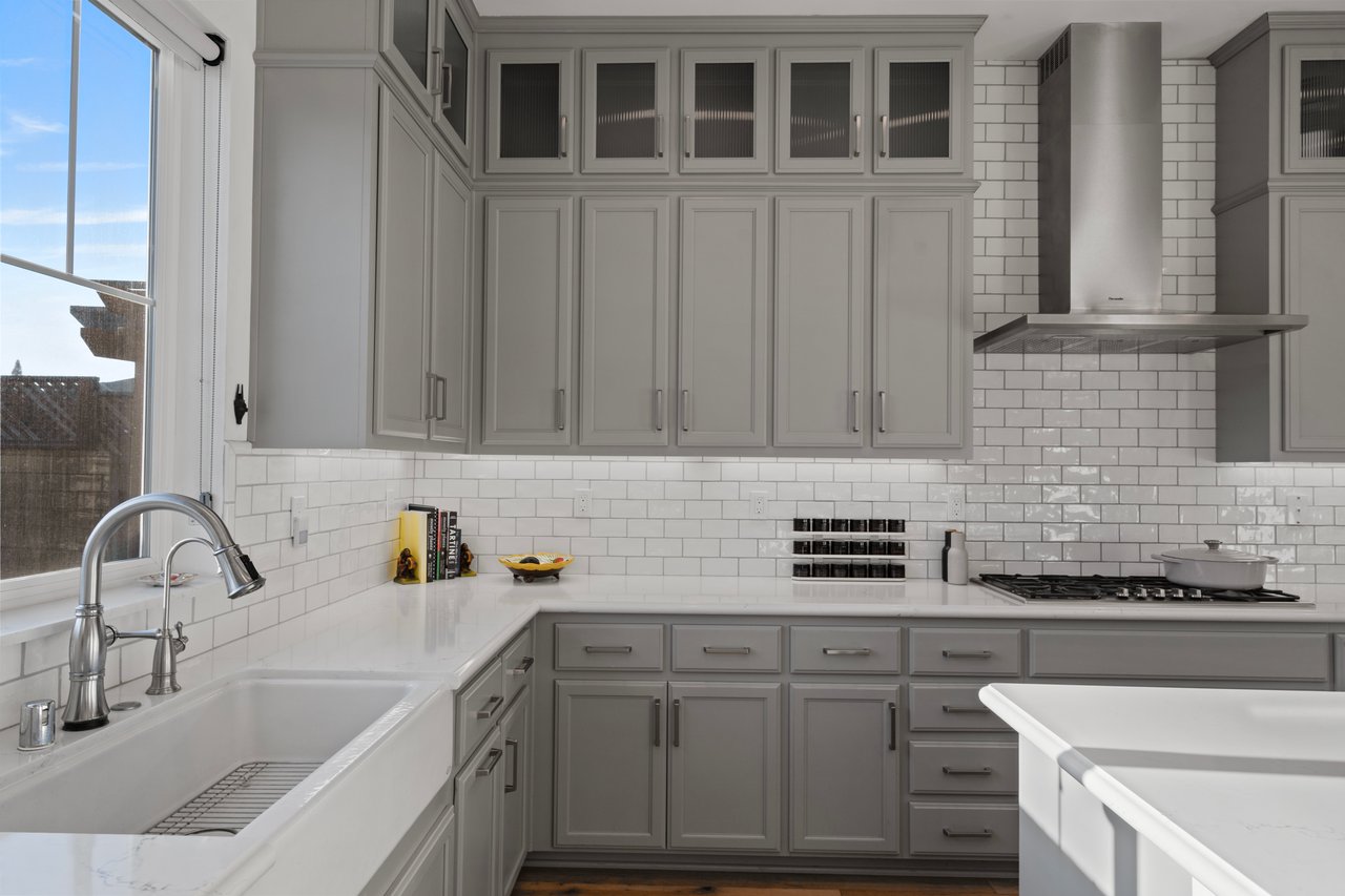 Craftsman-style kitchen with Shaker cabinetry and open-concept layout