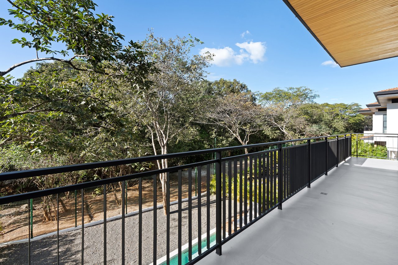 Villa Tropical Dawn | 4-Bedroom Modern Oasis in Bosques de Pinilla with Forest Views & Resort-Style Amenities